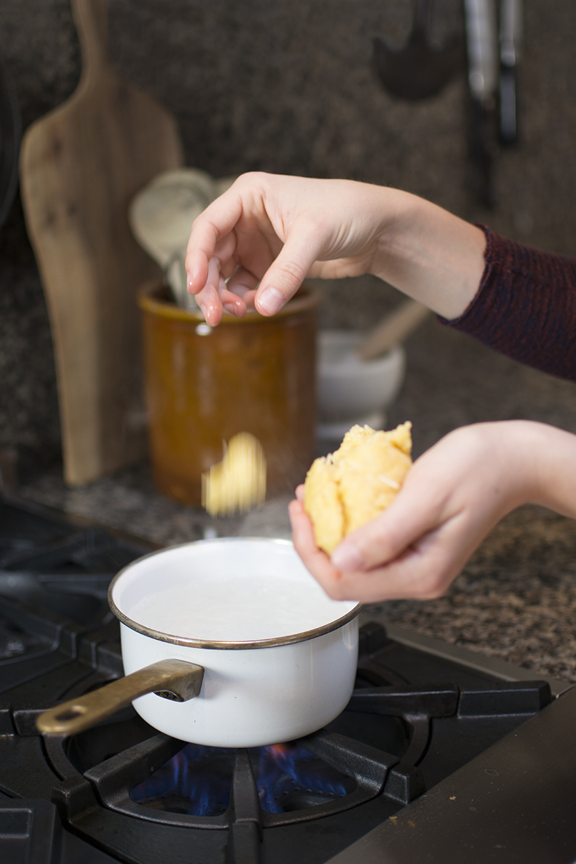Hands Dropping Dumplings